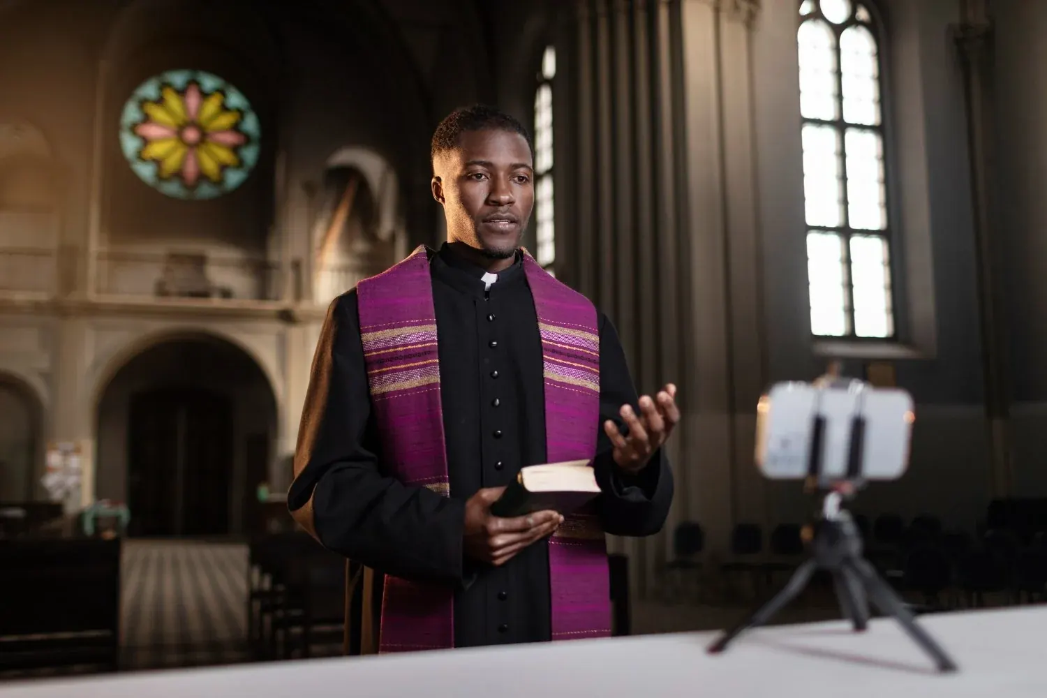 A pastor speaking in a church